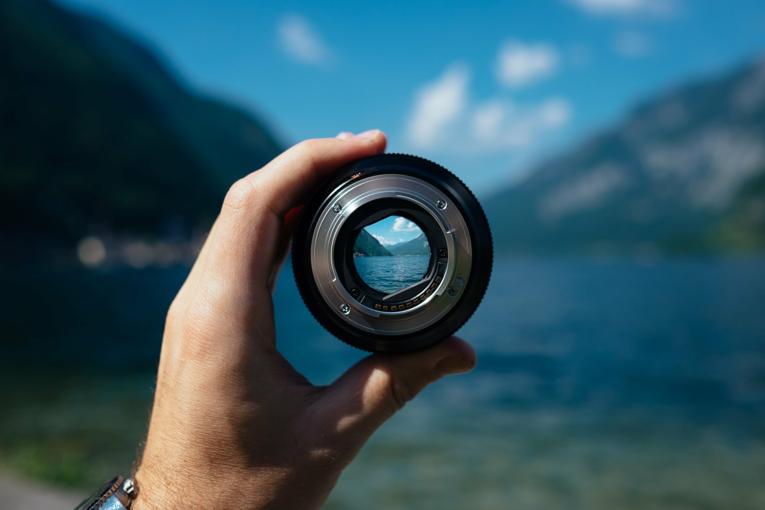 Looking through a lens at a lake. Judging risk